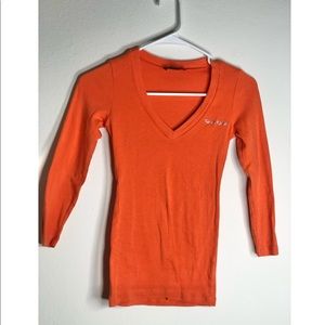 Small Bebe long sleeve shirt
